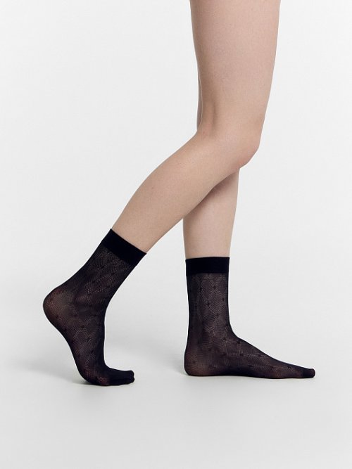 Носки женские капроновые черные с рисунком в виде ромбов, фото 1 из 12