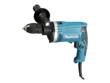 Дрель Makita HP1631K на акции в магазинах 5 элемент