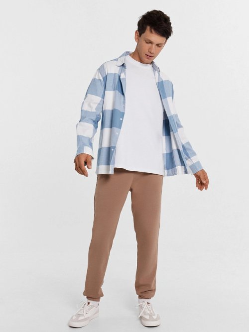 Брюки-джоггеры мужские в бежевом цвете, фото 1 из 5