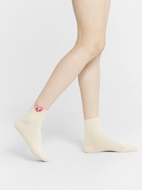 Носки женские бежевые с узором в виде сердечка, фото 1 из 4