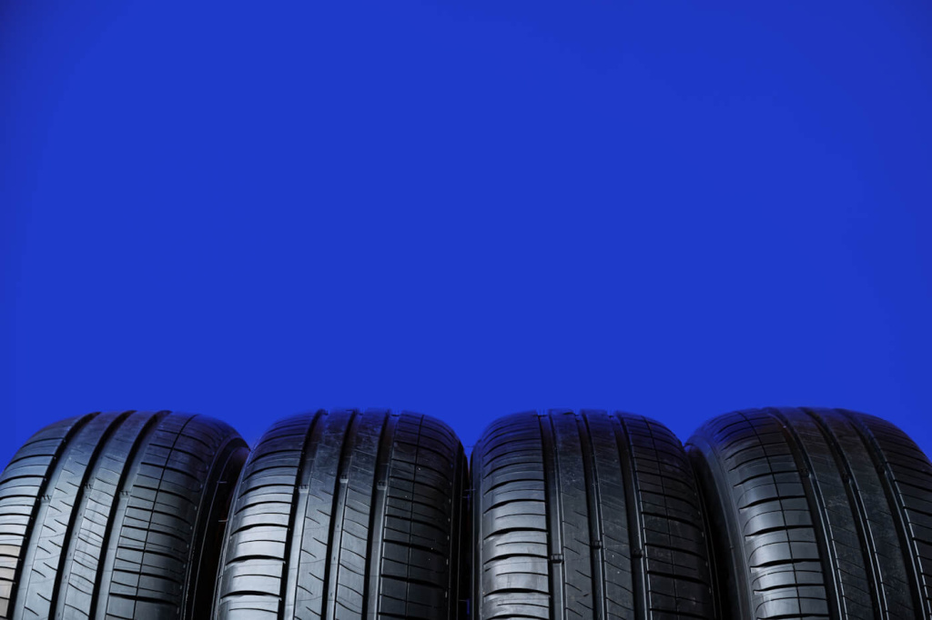 group-tires-blue-background